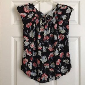 Black floral tank with tie back (item 027)